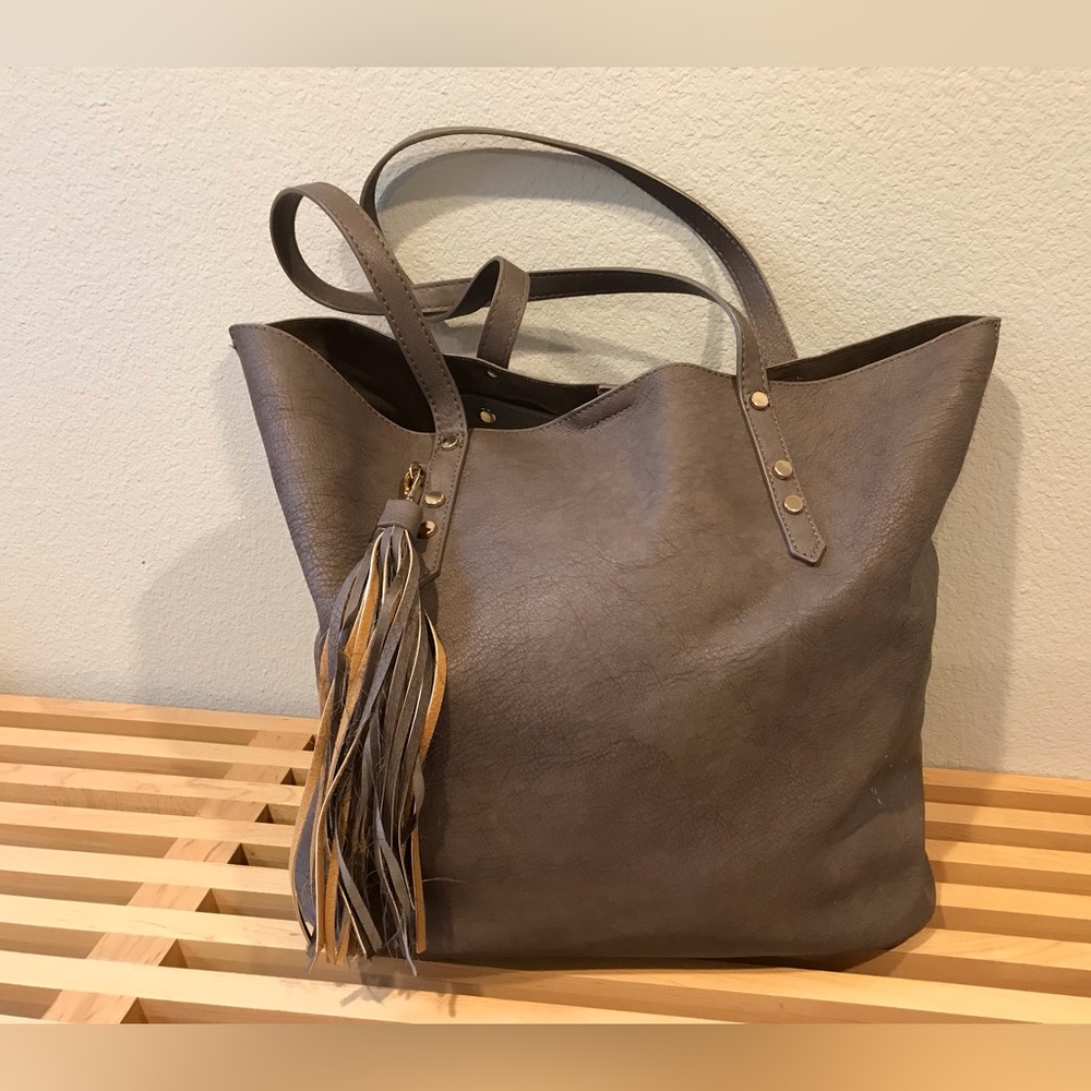 A large leather-like tote